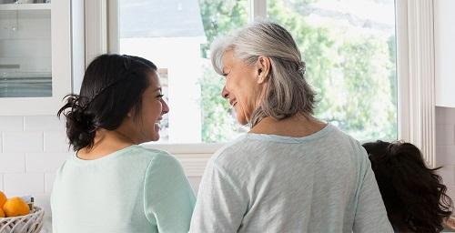 mother-daugther-smiling-at-each-other